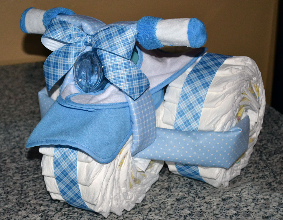 Подарок на рождение ребенка: что подарить новорожденному и его маме