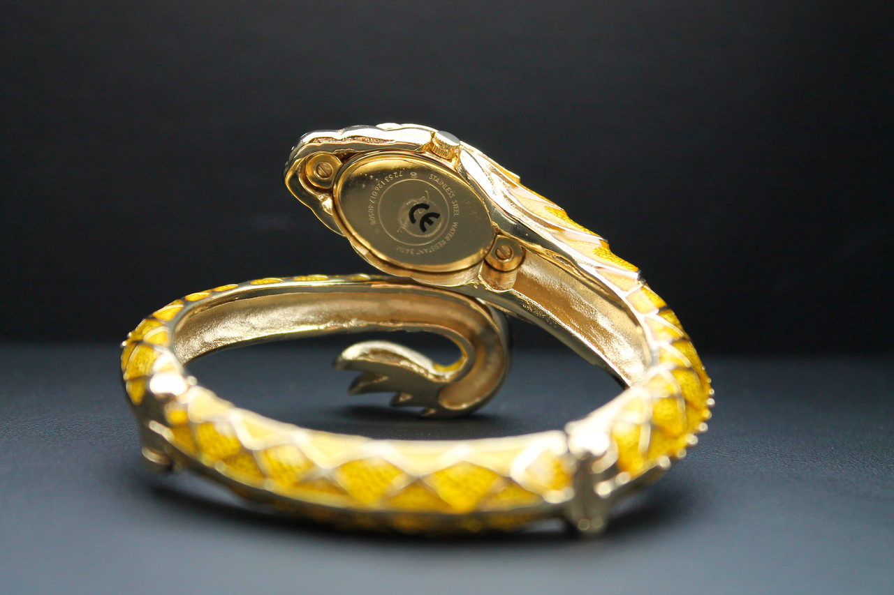 .   Roberto Cavalli EVA Snake Gold
